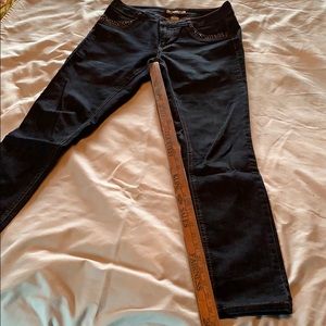 d. Jeans Dark navy skinny jeans, mid rise